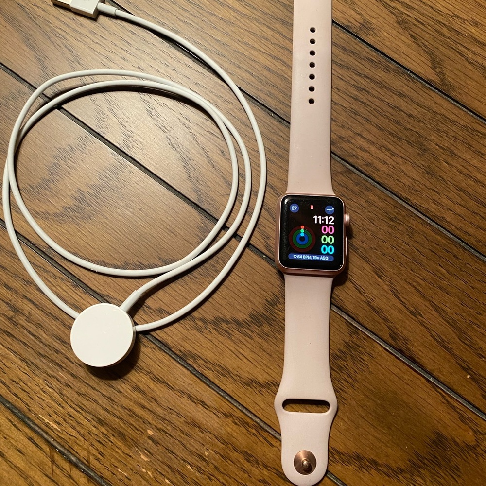 Apple Watch 38MM 7000 series with cord/bad in used condition